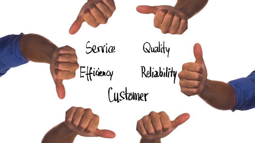 Hands giving thumbs up around the words service, quality, efficiency, reliability and customer