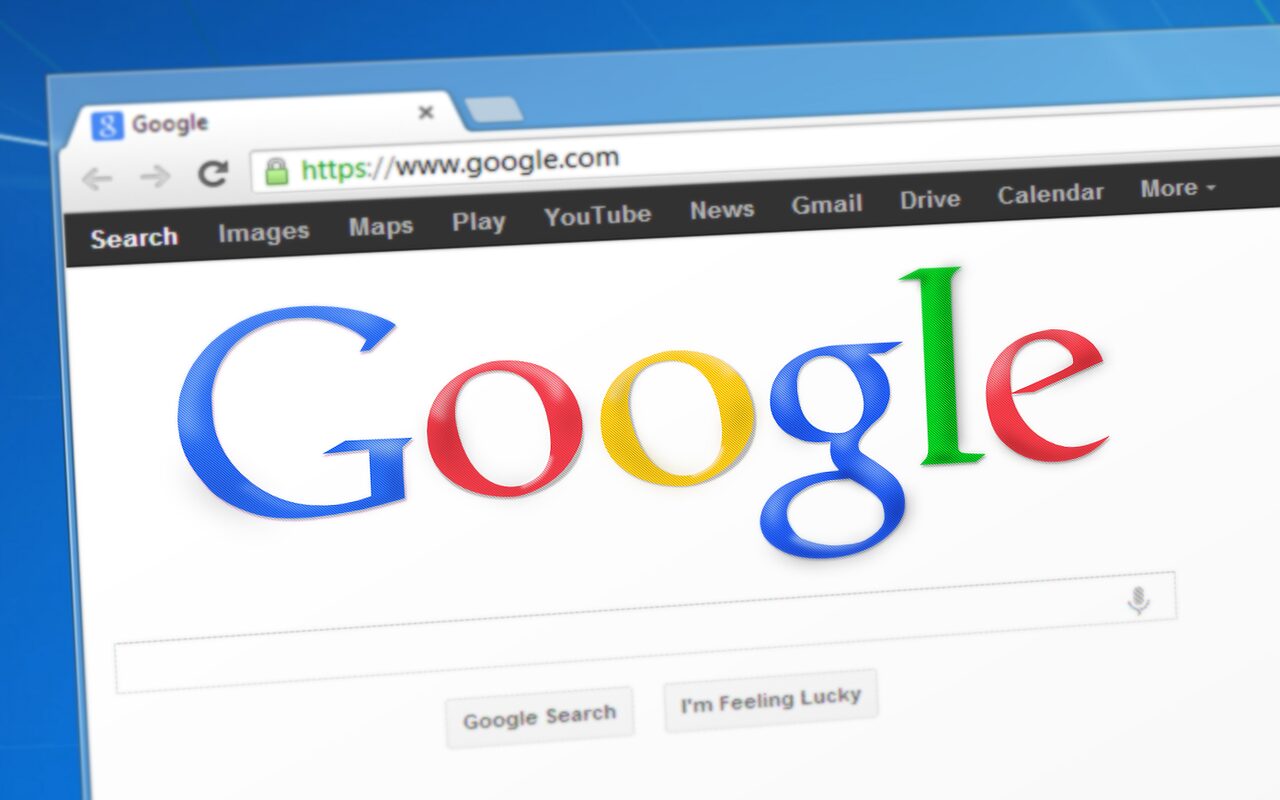 Google search homepage open in a browser on a laptop