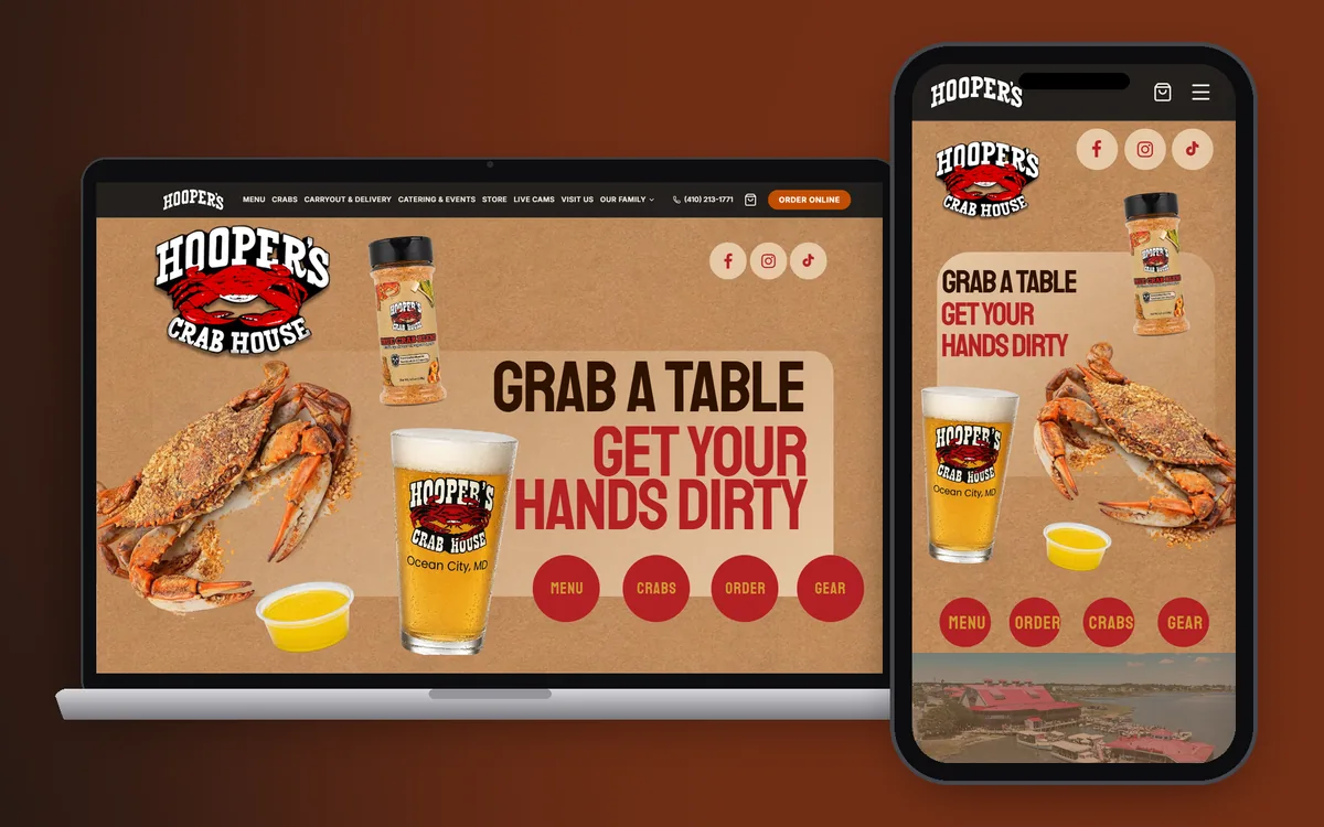Hooper's Crab House website on a laptop and phone, built by Shorecraft